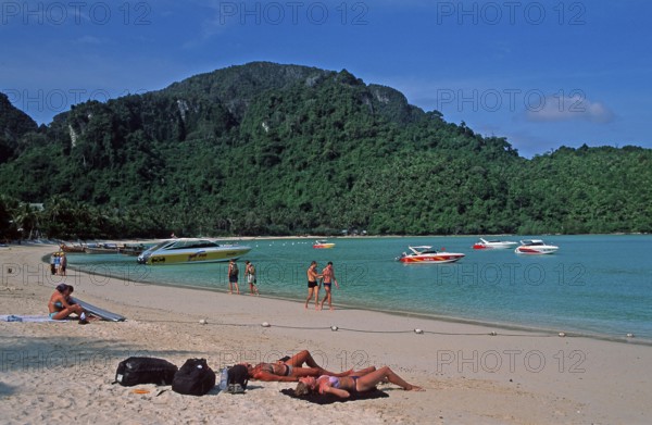 People, boats on the beach of Ko Phi Phi Don, two years in front of the tsunami, Thailand, December 2002, vintage, retro, old, historic