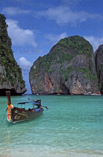 Longtail boat on Maya Bay beach, known from the movie The Beach, one year in front of the tsunami, Ko Phi Phi Le, Thailand, December 2002, vintage, retro, old, historic