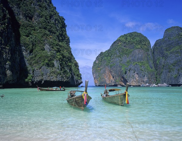 Longtail boats on Maya Bay beach, known from the movie The Beach, one year in front of the tsunami, Ko Phi Phi Le, Thailand, December 2002, vintage, retro, old, historic