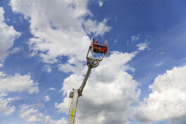 No limit carousel, fairground in Friedrichsau Ulm, folk festival, hustle and bustle, fair, amusement park, amusement attraction, ride, blue sky, clouds, Ulm, Baden-Württemberg, Germany