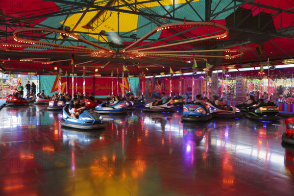 Bumper car, autodrome, bumper cars, boxing car, self-driver, fairground in Ulm Friedrichsau, public festival, hustle and bustle, ferris wheel, amusement park, amusement attraction, ride, clouds, Ulm, Baden-Württemberg, Germany