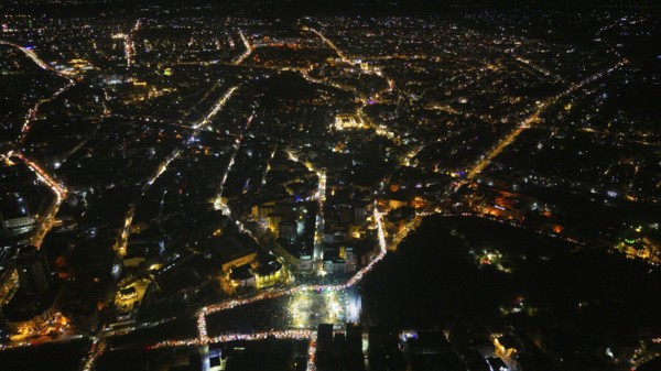 A Drone night view of Aleppo, Syria on December 19, 2025, showing illuminated streets, dense residential areas, and major traffic routes under the night sky, Aleppo, Aleppo, Syria