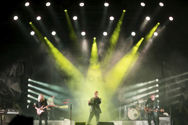 Bernd Römer (guitarist), Martin Becker (keyboarder), Claudius Dreilich (singer), Heiko Jung (drummer) and Daniel Bätge (bassist) from Karat live on 50 Years of KARAT Tour in Berlin's Max-Schmeling-Halle on 19 December 2025