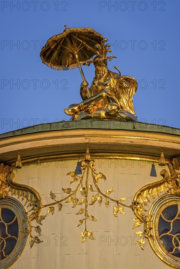 Chinese house in the evening light, tea house with golden sculptures, Sanssouci Park, Potsdam