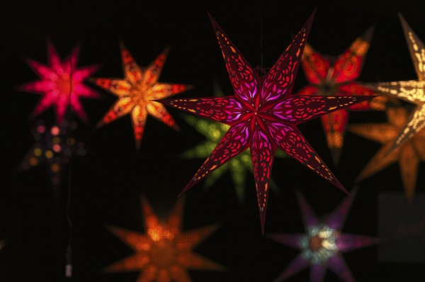 Colorful Christmas stars, sales stand, baroque Christmas market, blue hour, dusk, Ludwigsburg, Baden-Württemberg, Germany