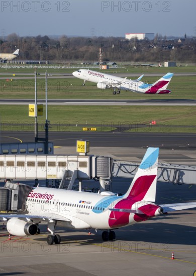 Eurowings aircraft, at terminal A and at takeoff, Düsseldorf airport, DUS