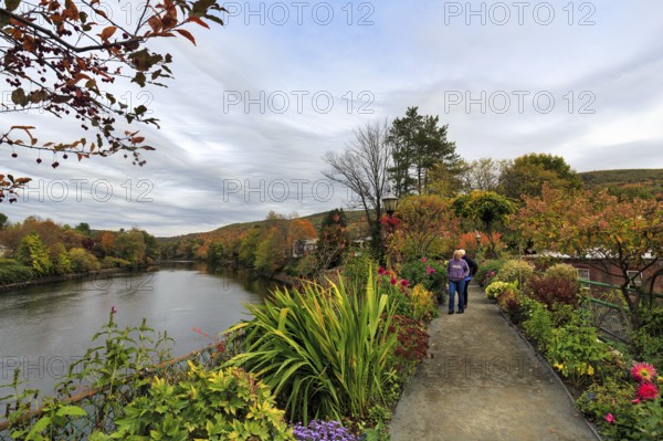 Flower bridge, Bridge of Flowers, bridge over Deerfield River, gardens, riverscape, walkers, autumn leaves, Indian summer, Mohawk Trail panoramic road, former trade route, Shelburne Falls, Massachusetts, New England, USA