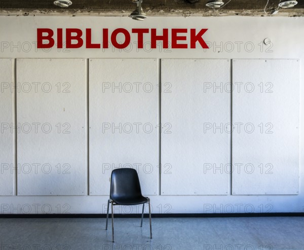 Empty chairs stand in front of access to a library, Berlin, Germany, which has been closed due to construction work