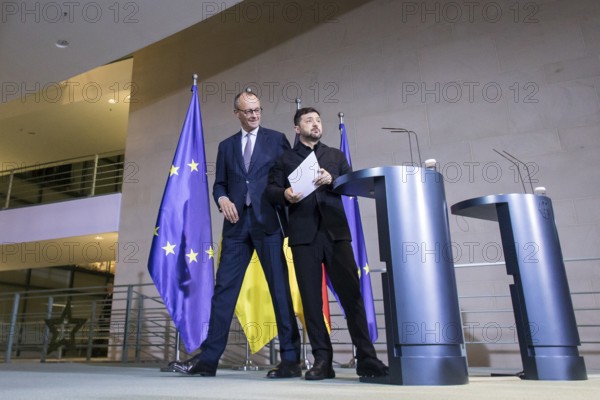 Friedrich Merz (Chancellor of the Federal Republic of Germany) and Volodymyr Zelensky (President of Ukraine) leave the press conference at the Federal Chancellery after the 8th German-Ukrainian Economic Forum, 15.08.2025