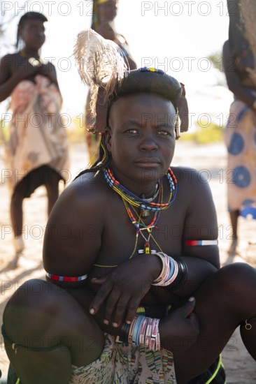 Portrait, brightly decorated woman of the Hakaona tribe, also Havakona or Hakawona, near Opuwo, Kunene, Namibia