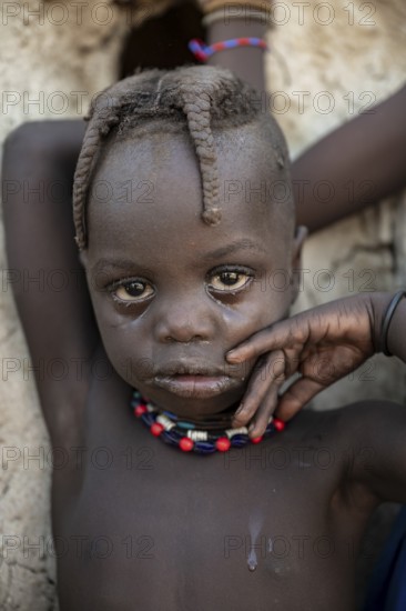Himba child, traditional Himba village, Kaokoveld, Kunene, Namibia