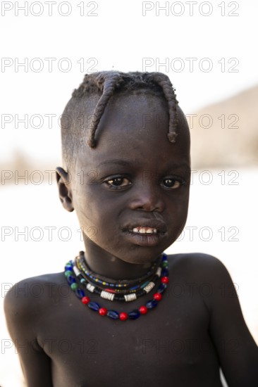 Portrait, Himba child, traditional Himba village, Kaokoveld, Kunene, Namibia
