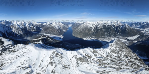 Aerial view, epic view of mountain landscape with snow in winter, summit of Bärenkopf, Achensee, Tyrol, Austria