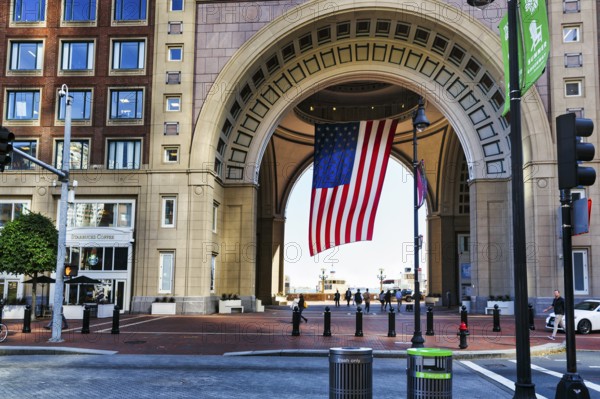 American flag fluttering, distinctive archway, Boston Harbor Hotel, Rowes Wharf, Freedom Trail, Financial District, Downtown, Boston, Massachusetts, New England, USA