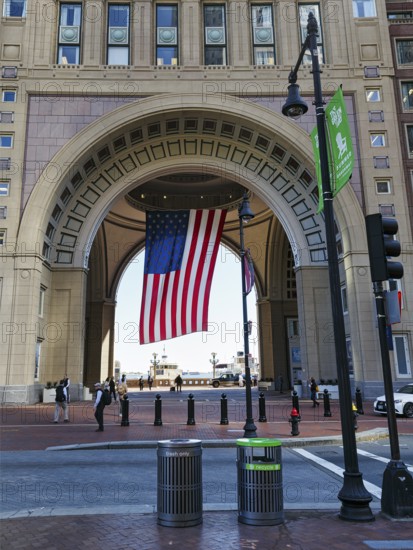 American flag fluttering, distinctive archway, Boston Harbor Hotel, Rowes Wharf, Freedom Trail, Financial District, Downtown, Boston, Massachusetts, New England, USA
