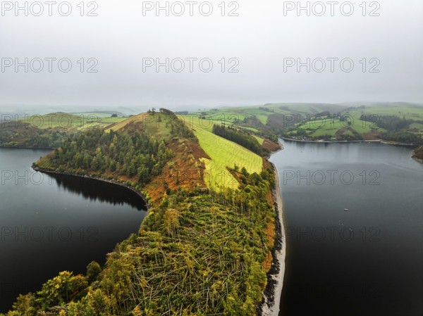 Autumn colours over Llyn Clywedog and Clywedog Reservoir from a drone, Llanidloes, Wales, UK