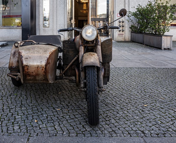 Retro motorcycle with sidecar, old and rusted, roadworthy and officially approved, Berlin, Germany