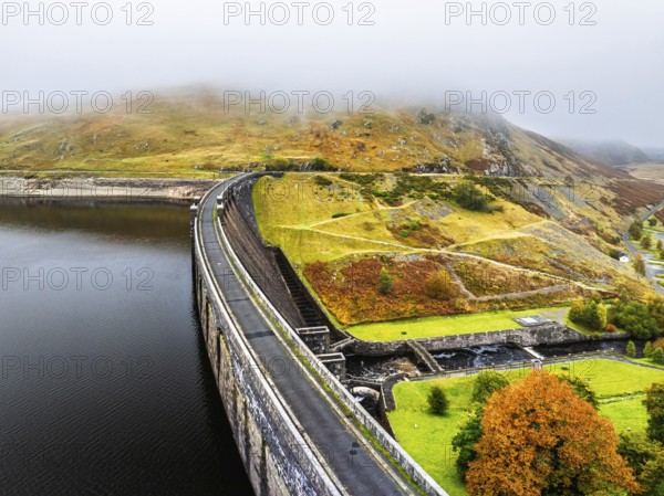 Autumn over Claerwen Dam, Claerwen Valley, Elan Valley Reservoir, Rhayader, Powys, Wales, UK