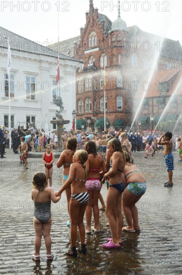 A popular event every year in August is when the Ystad Volunteer Fire Brigade takes the old fire pump made in 1850 to the square and sprays water on the assembled children, who are then baptized as true Ystad residents. Ystad, Skåne County, Sweden, Scandinavia