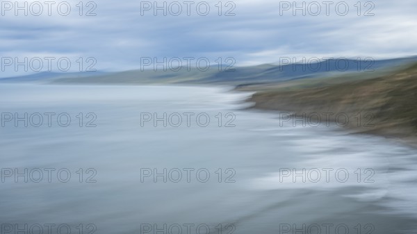 Wairarapa coast, sea, mountains, blurred, long exposure, ICM. Castlepoint, Wairarapa Coast, Wellington Region, North Island, New Zealand