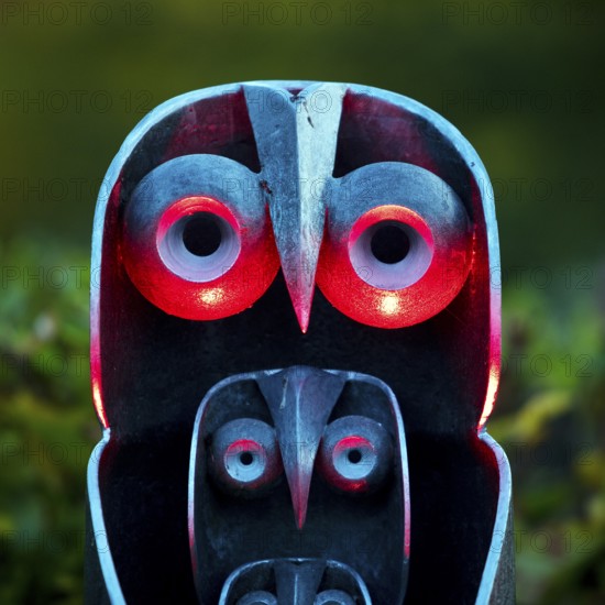 Illumination of an owl-like object during the HerbstlichtGarten event in Sauerlandpark in the evening in Hemer, Sauerland, North Rhine-Westphalia, Germany