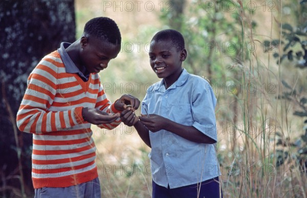 Boys on the roadside, Zambia, Africa, June 2000, vintage, retro, old, historic