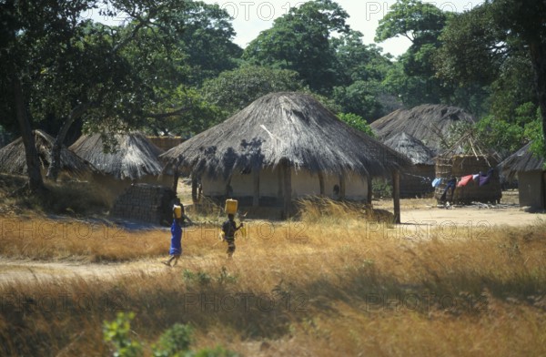 Thatched huts in a village in Zambia, Africa, June 2000, vintage, retro, old, historic