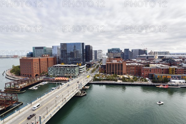 View of Northern Avenue Bridge over Fort Point Channel, steel swing bridge, Seaport District, skyline, modern architecture, office towers, residential buildings, cultural offerings, Downtown, Boston, Massachusetts, New England, USA
