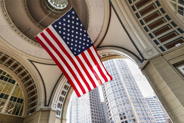 American flag fluttering, distinctive archway, Boston Harbor Hotel, Rowes Wharf, Freedom Trail, Financial District, Downtown, Boston, Massachusetts, New England, USA