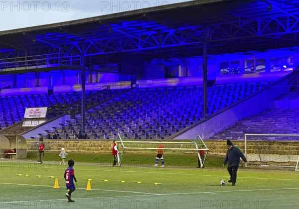 Youth training in the royal blue Glückauf Kampfbahn of FC Schalke 04, Gelsenkirchen, Ruhr area, North Rhine-Westphalia, Germany
