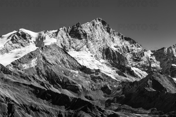 Snowy peak of Weisshorn mountain, black and white photo, Val d'Anniviers, Valais Alps, Canton of Valais, Switzerland
