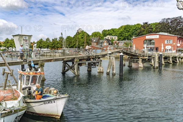 Eckernförde wooden bridge and the Siegfried shipyard at the inland port in Eckernförde, Schleswig-Holstein, Germany