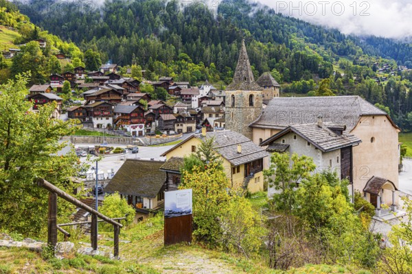 The mountain village of Vissoie with the Sainte-Euphemie church, Val d'Anniviers, Valais Alps, Canton of Valais, Switzerland