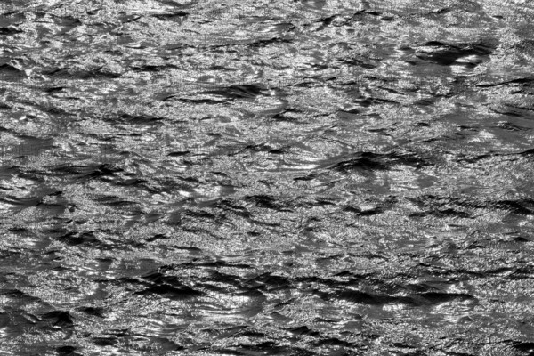 Water surface with waves and light reflections, black and white, Möhnesee, Möhnetalsperre, North Rhine-Westphalia, Germany