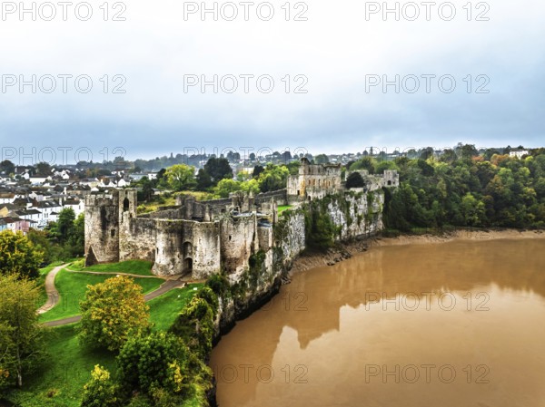 Autumn over Chepstow Castle and River Wye from a drone, Chepstow, Monmouthshire, Wales, UK