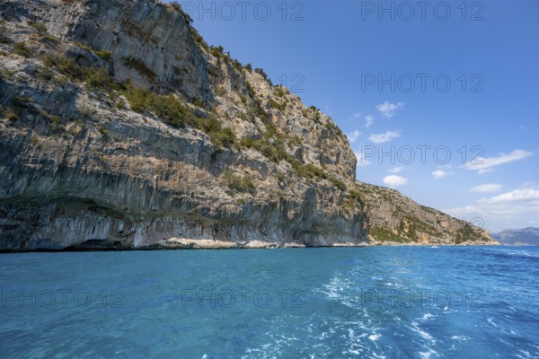 Picturesque rocky coast, cliffs and blue sea, Golfo di Orosei, Baunei, Sardinia, Italy