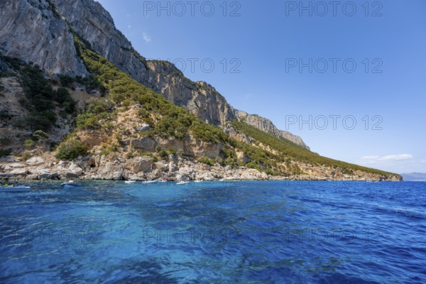 Picturesque rocky coast, cliffs and blue sea at Piscine di Venere, Golfo di Orosei, Baunei, Sardinia, Italy