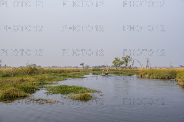 Safari by boat, tourists, Xakanaxa Lagoon, Okavango Delta, Moremi Game Reserve, Botswana