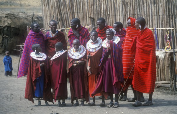 Maasai men and girls in their village in Ngorongoro Crater, Tanzania, Africa, June 2000, vintage, retro, old, historic