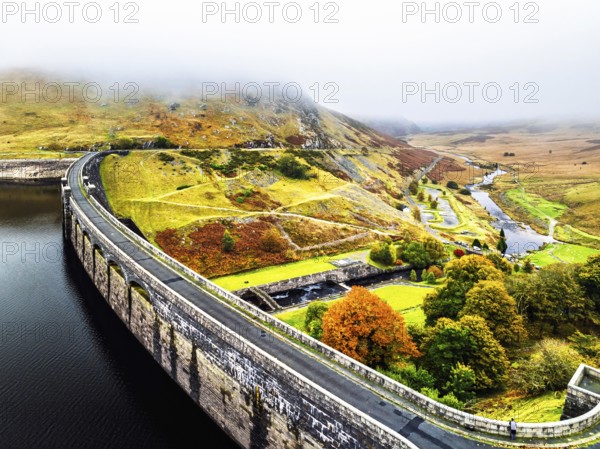 Autumn over Claerwen Dam, Claerwen Valley, Elan Valley Reservoir, Rhayader, Powys, Wales, UK