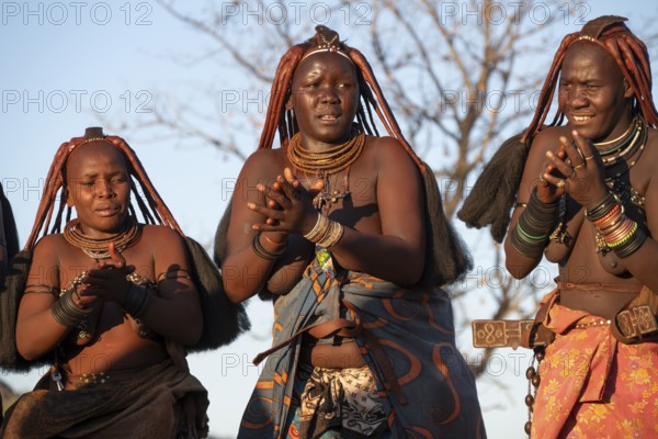 Himba woman dancing euphorically, traditional dance, traditional Himba village, Kaokoveld, Kunene, Namibia