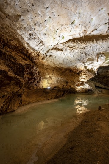 Stalactites and stalagmites, reflection in a small underground lake, rock formations in a stalactite cave, Grotta del Fico, Gulf of Orosei, Baunei, Sardinia, Italy