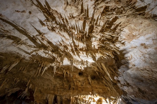 Stalactites and rock formations in a stalactite cave, Grotta del Fico, Gulf of Orosei, Baunei, Sardinia, Italy