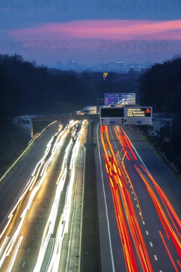 Evening traffic on the A52 motorway, between Düsseldorf and Essen, in front of the Breitscheid motorway junction, partly slow rush hour traffic, looking south, North Rhine-Westphalia, Germany
