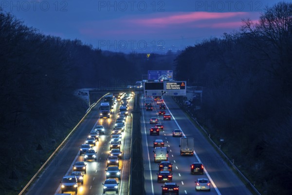 Evening traffic on the A52 motorway, between Düsseldorf and Essen, in front of the Breitscheid motorway junction, partly slow rush hour traffic, looking south, North Rhine-Westphalia, Germany