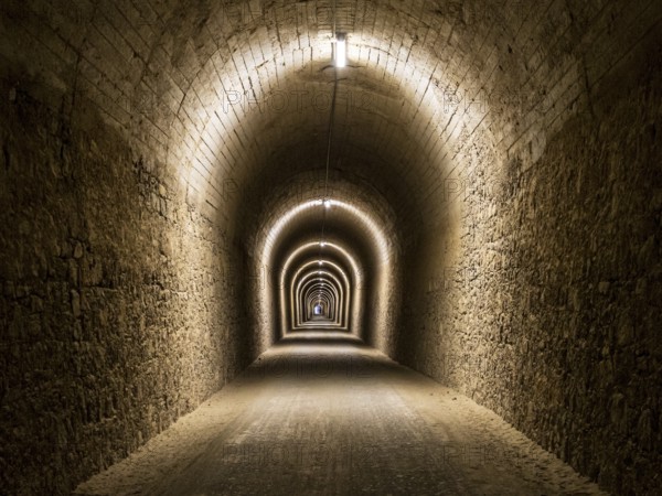 Tunnel del Castillo, Coripe Mountain Tunnel, illuminated longest tunnel on cycle path Via Verde de la Sierra, Puerto Serrano to Olvera, old railroad track, Andalusia, Spain