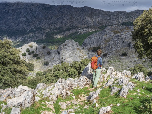Hiking woman, mountain range Sierra de Grazalema, Parque natural de la Sierra de Grazalema, Andalusia, Spain