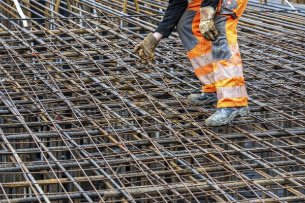 Assembly of reinforcing steel for the reinforced concrete foundation of a wind turbine, a mesh of rebar and rebar mesh, over 100 tons of reinforcing steel were used, the wind turbine will have a hub height of 160 meters, part of a new wind farm in Sauerland, near Balve, North Rhine-Westphalia, Germany