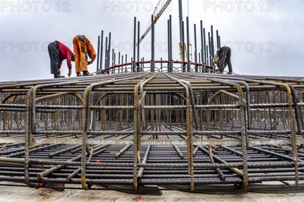 Assembly of reinforcing steel for the reinforced concrete foundation of a wind turbine, a mesh of rebar and rebar mesh, over 100 tons of reinforcing steel were used, the wind turbine will have a hub height of 160 meters, part of a new wind farm in Sauerland, near Balve, North Rhine-Westphalia, Germany