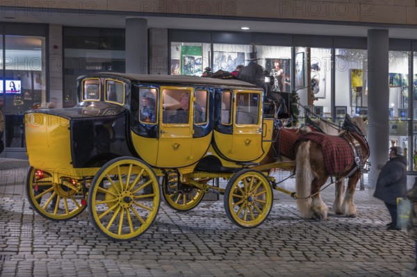 Historic stagecoach rides with horseback during the Nuremberg Christmas Market, Nuremberg, Middle Franconia, Bavaria, Germany